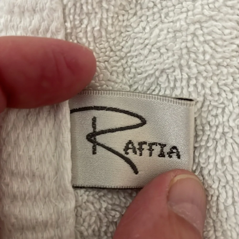 Two Raffia hand towels monogrammed with Caroline
